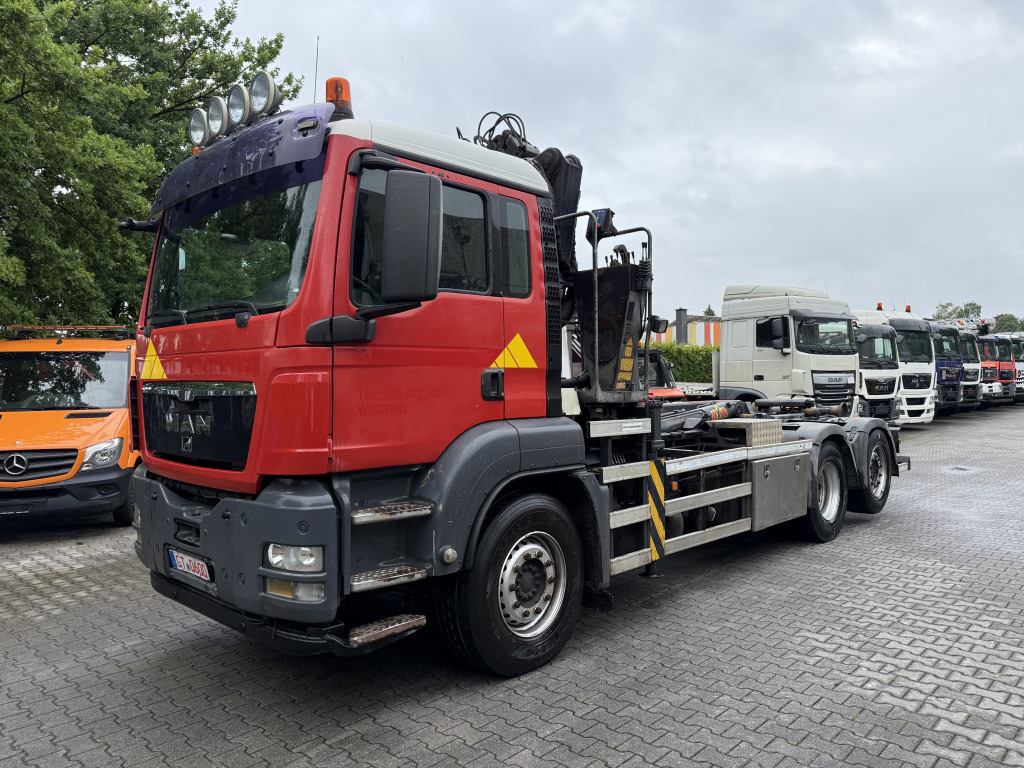 MAN TGS 26.360 6X2 Haken mit Kran HMF 1643Z - Kotalni prekucni tovornjak, Tovornjak z dvigalom: slika 1 MAN TGS 26.360 6X2 Haken mit Kran HMF 1643Z - Kotalni prekucni tovornjak, Tovornjak z dvigalom: slika 1