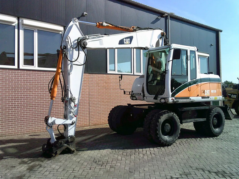 Caterpillar M313D - Bager na kolesih: slika 1 Caterpillar M313D - Bager na kolesih: slika 1