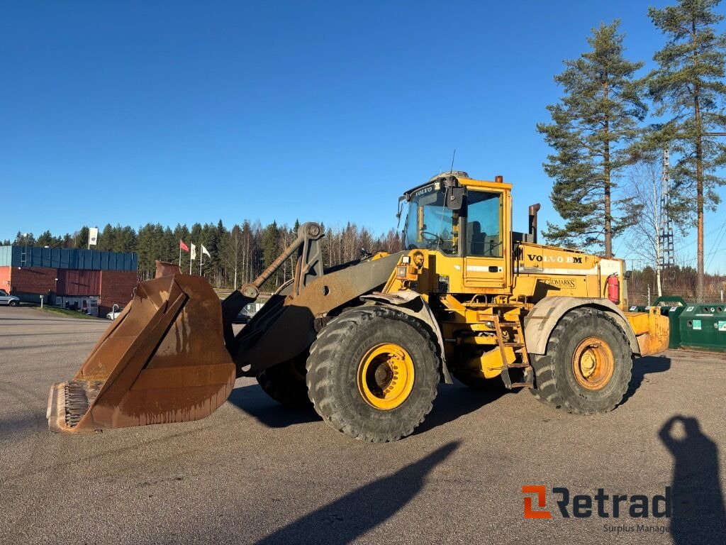 Hjullastare Volvo L180 med skopa - Kolesni nakladalec: slika 1 Hjullastare Volvo L180 med skopa - Kolesni nakladalec: slika 1