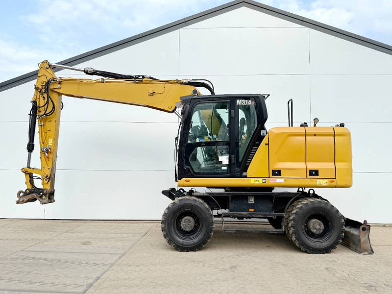 Cat M314 next gen - Triple Boom / Automatic Greasing - Bager na kolesih: slika 1 Cat M314 next gen - Triple Boom / Automatic Greasing - Bager na kolesih: slika 1