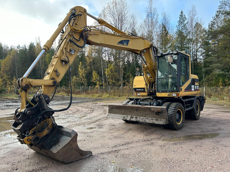 Caterpillar M312 Engcon EC20 tiltrotator - Bager na kolesih: slika 1 Caterpillar M312 Engcon EC20 tiltrotator - Bager na kolesih: slika 1