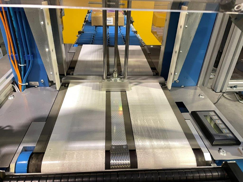 ATS Tanner UltraSonic US 2000-AB transit banding machine with pneumatic product hold-down and infeed roller table - Oprema za pakiranje: slika 5 ATS Tanner UltraSonic US 2000-AB transit banding machine with pneumatic product hold-down and infeed roller table - Oprema za pakiranje: slika 5