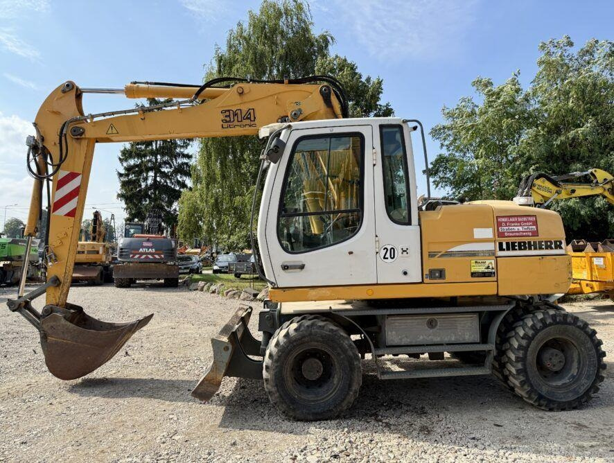 Liebherr A314 - Bager na kolesih: slika 1 Liebherr A314 - Bager na kolesih: slika 1