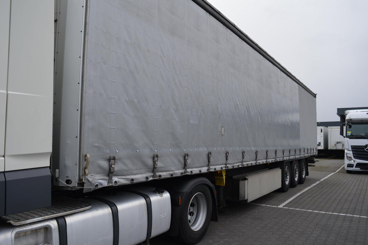 Schmitz Cargobull SCS24/L Lifting Axle - Polprikolica s ponjavo: slika 2 Schmitz Cargobull SCS24/L Lifting Axle - Polprikolica s ponjavo: slika 2
