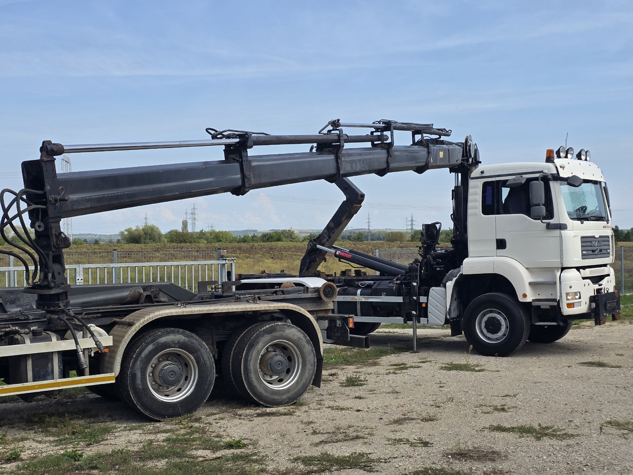 MAN TGA 26.440 6X6 / HOOK SYSTEM / HIAB 166D REMOTE SPECIAL PRICE ONLY THIS YEAR - Kotalni prekucni tovornjak, Tovornjak z dvigalom: slika 4 MAN TGA 26.440 6X6 / HOOK SYSTEM / HIAB 166D REMOTE SPECIAL PRICE ONLY THIS YEAR - Kotalni prekucni tovornjak, Tovornjak z dvigalom: slika 4