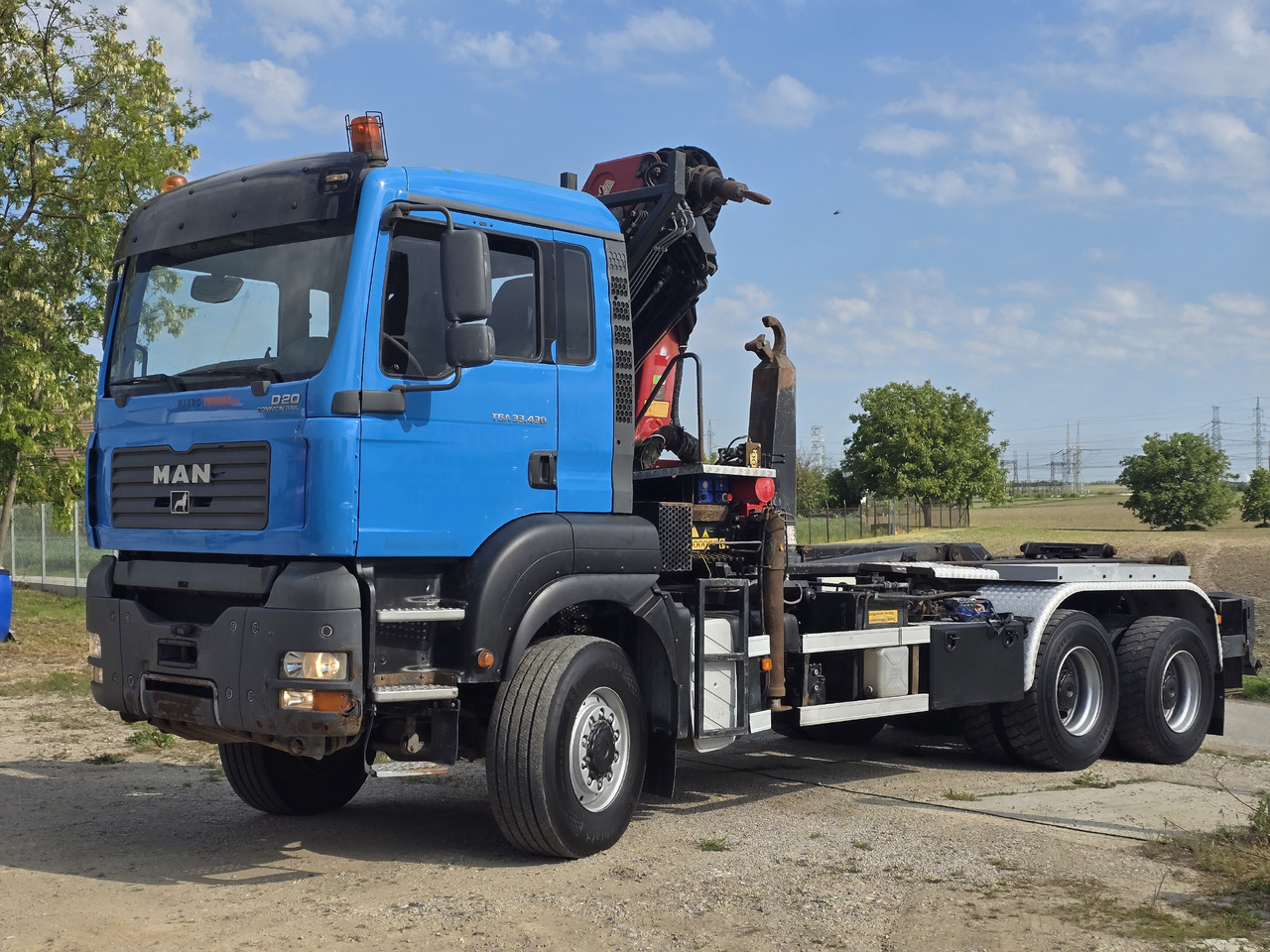 MAN TGA 33.430 6X6 / HMF 1823 K3+REM.CON./ HOOK SYSTEM - Kotalni prekucni tovornjak, Tovornjak z dvigalom: slika 3 MAN TGA 33.430 6X6 / HMF 1823 K3+REM.CON./ HOOK SYSTEM - Kotalni prekucni tovornjak, Tovornjak z dvigalom: slika 3
