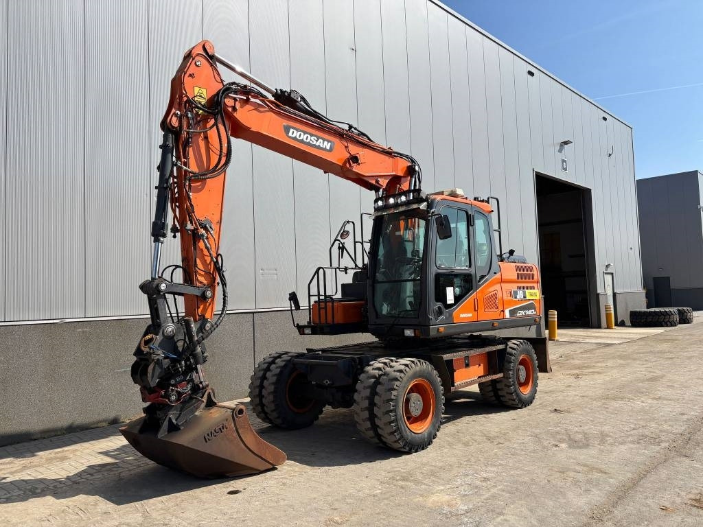 Doosan DX 140 W-5 (R5 Rototilt) - Bager na kolesih: slika 2 Doosan DX 140 W-5 (R5 Rototilt) - Bager na kolesih: slika 2