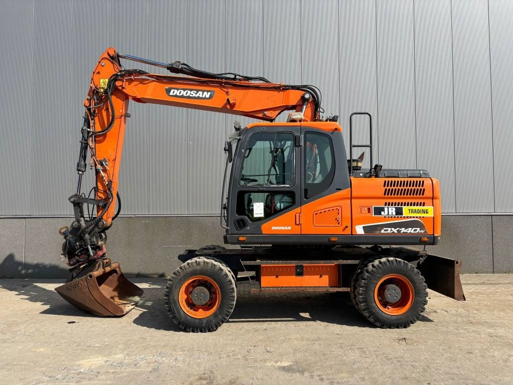 Doosan DX 140 W-5 (R5 Rototilt) - Bager na kolesih: slika 1 Doosan DX 140 W-5 (R5 Rototilt) - Bager na kolesih: slika 1