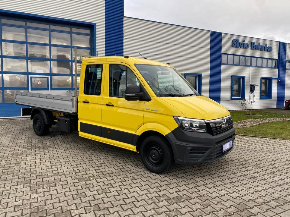 MAN TGE 3.140 Doka Pritsche Lang *STANDHZG* AHK*HECKANTRIEB*1.HAND*INKL.19% MWST*SOFORT!* - Dostavno vozilo s kesonom, Dostavno vozilo z dvojno kabino: slika 1 MAN TGE 3.140 Doka Pritsche Lang *STANDHZG* AHK*HECKANTRIEB*1.HAND*INKL.19% MWST*SOFORT!* - Dostavno vozilo s kesonom, Dostavno vozilo z dvojno kabino: slika 1