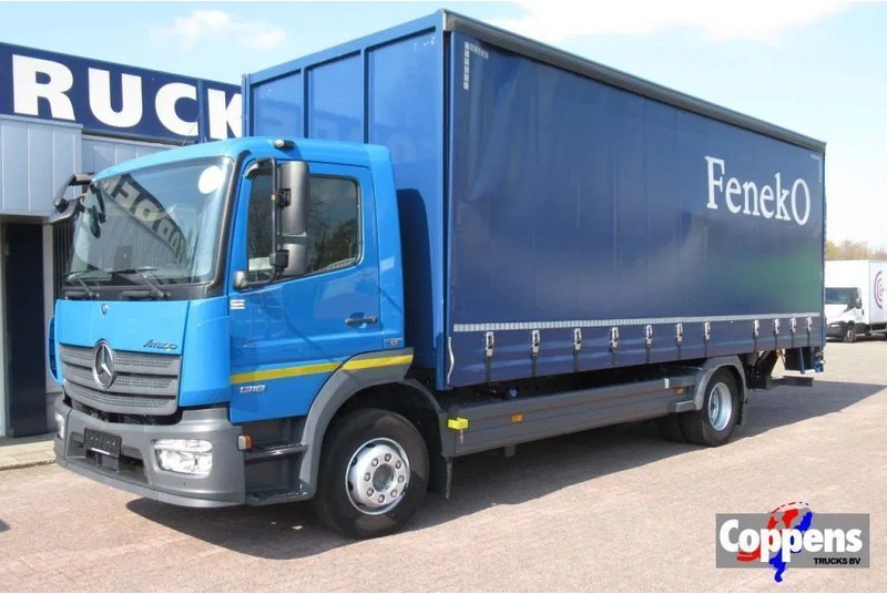 Mercedes-Benz Atego 1318L Euro 6 - Tovornjak s ponjavo: slika 1 Mercedes-Benz Atego 1318L Euro 6 - Tovornjak s ponjavo: slika 1