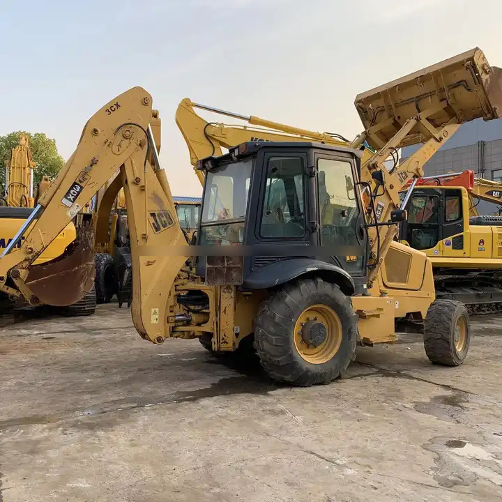 High Quality Original Uk JCB 3CX excavator used wheel loaders 7 ton backhoe loader with good working condition in stock for sale - Bager nakladalec: slika 1 High Quality Original Uk JCB 3CX excavator used wheel loaders 7 ton backhoe loader with good working condition in stock for sale - Bager nakladalec: slika 1