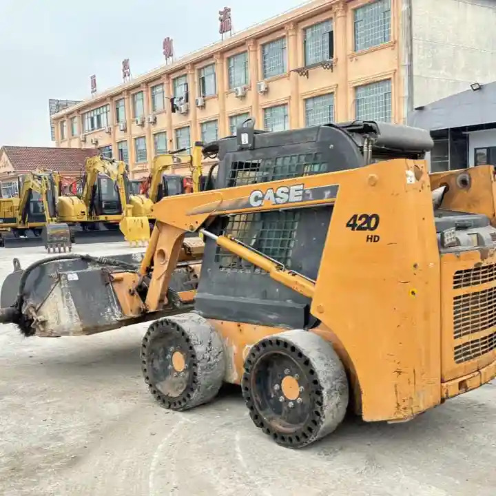Used Case 420 Backhoe Loader Used Skid Steer Loader CASE 430 CASE 440 - Mini nakladalec: slika 1 Used Case 420 Backhoe Loader Used Skid Steer Loader CASE 430 CASE 440 - Mini nakladalec: slika 1