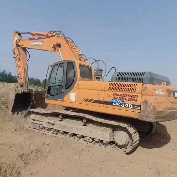 Used Original Korea Doosan 34 Ton Excavator with Cheap Price and Good Condition DOOSAN Dx340LCA Dx225 Dx330 DX360for Sale - Bager goseničar: slika 1 Used Original Korea Doosan 34 Ton Excavator with Cheap Price and Good Condition DOOSAN Dx340LCA Dx225 Dx330 DX360for Sale - Bager goseničar: slika 1