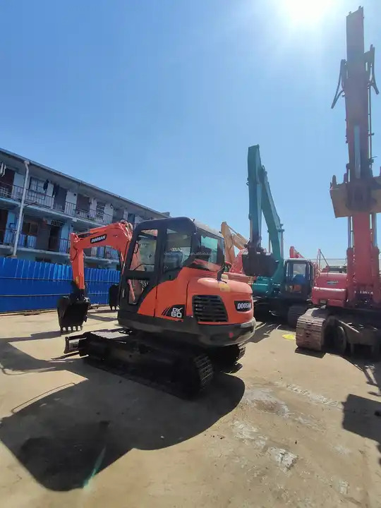 Used excavator doosan dx60 excavators earth-moving machinery doosan dx60 dx80 dx75 dx225 for sale - Bager goseničar: slika 5 Used excavator doosan dx60 excavators earth-moving machinery doosan dx60 dx80 dx75 dx225 for sale - Bager goseničar: slika 5