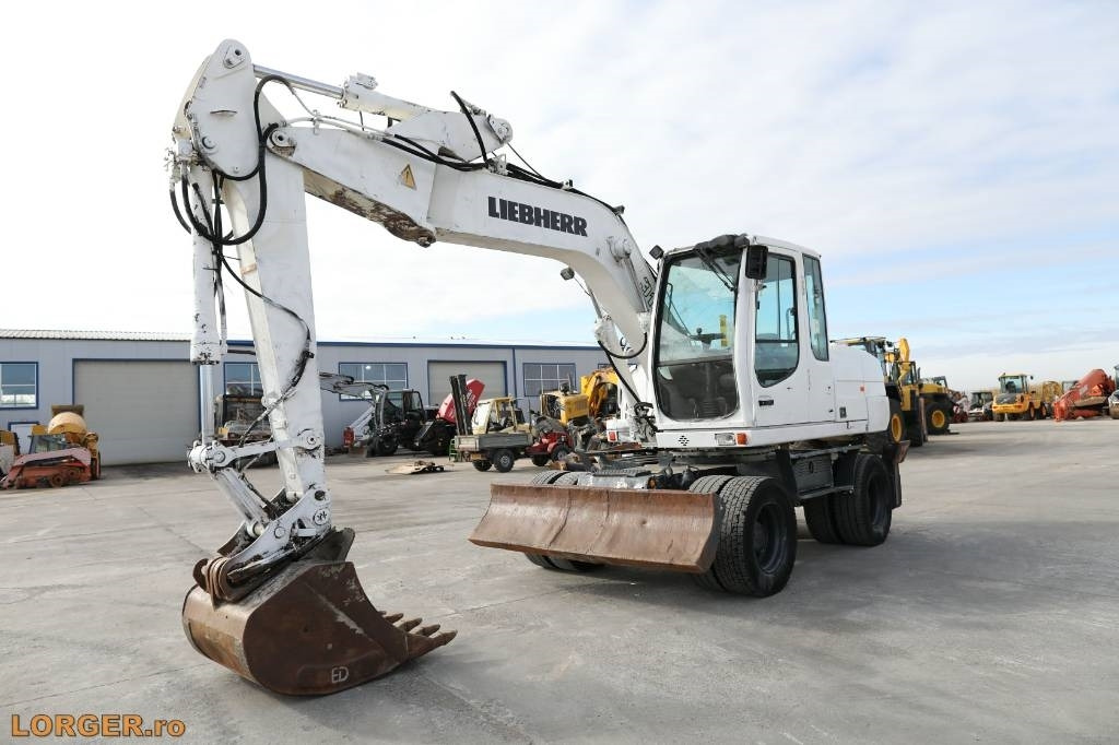 Liebherr A 316 Litronic - Bager na kolesih: slika 1 Liebherr A 316 Litronic - Bager na kolesih: slika 1