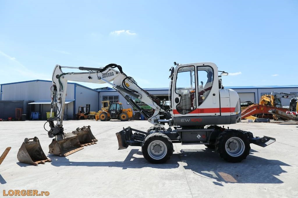Wacker Neuson EW 100 - Bager na kolesih: slika 1 Wacker Neuson EW 100 - Bager na kolesih: slika 1