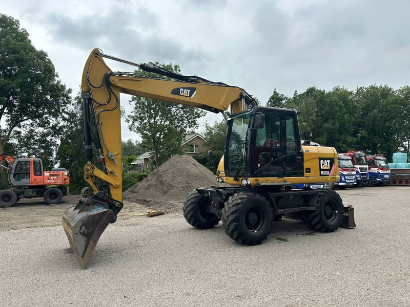 Cat M 313 D - Bager na kolesih: slika 1 Cat M 313 D - Bager na kolesih: slika 1