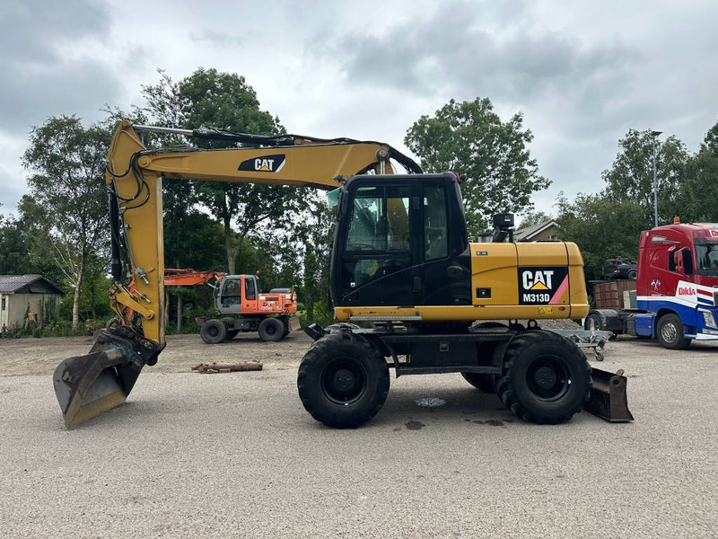 Cat M 313 D - Bager na kolesih: slika 1 Cat M 313 D - Bager na kolesih: slika 1