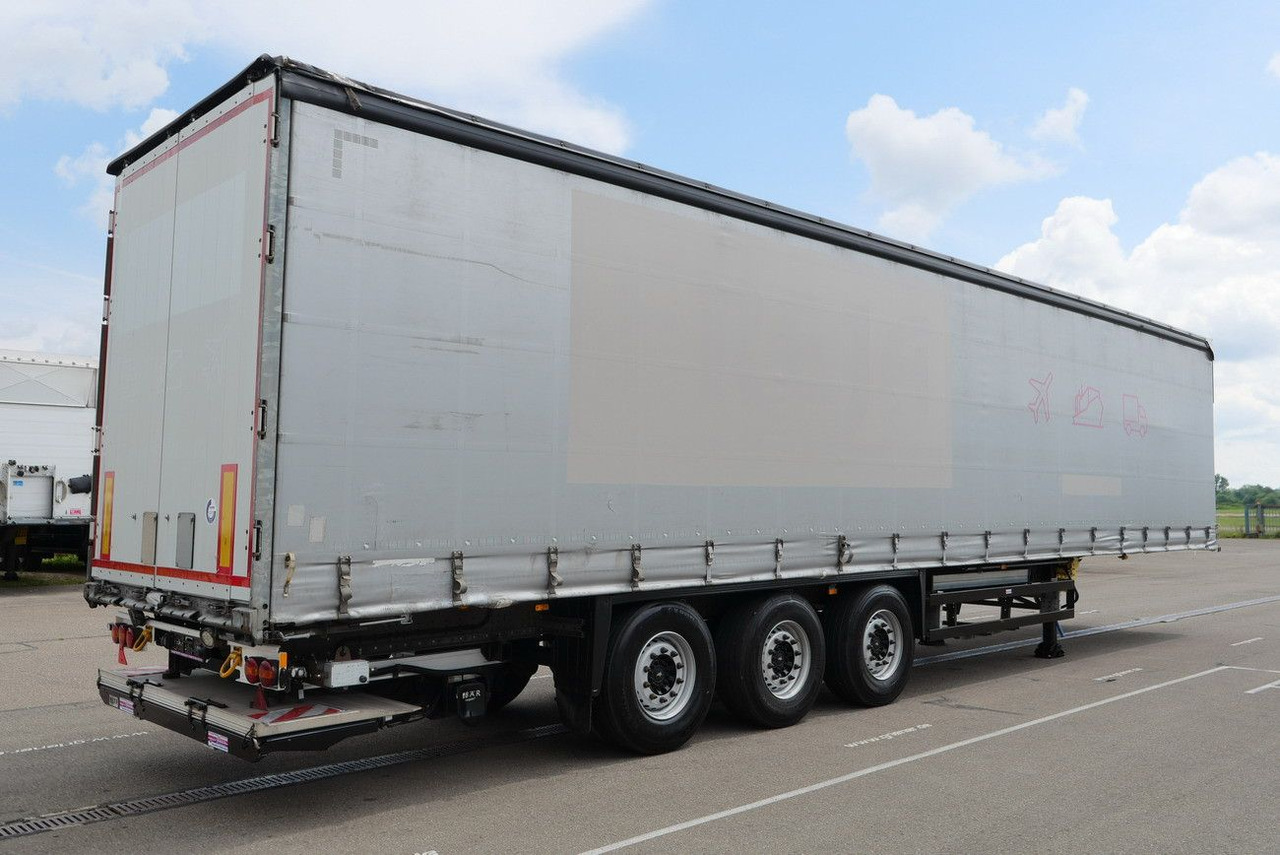 Schmitz Cargobull SCS 24/ LBW 2000 kg / RUNGENTASCHEN / HUBDACH - Polprikolica s ponjavo: slika 5 Schmitz Cargobull SCS 24/ LBW 2000 kg / RUNGENTASCHEN / HUBDACH - Polprikolica s ponjavo: slika 5