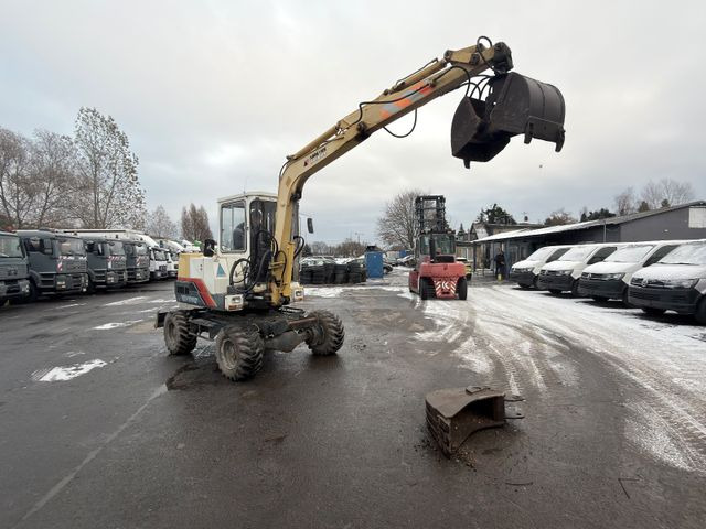 Yanmar YB 401 W Greifer und Schaufel - Bager na kolesih: slika 1 Yanmar YB 401 W Greifer und Schaufel - Bager na kolesih: slika 1