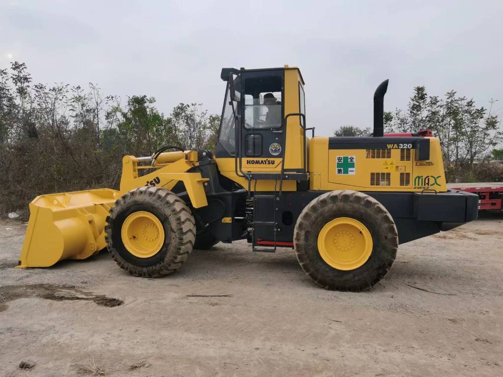Komatsu WA 320-5 - Kolesni nakladalec: slika 1 Komatsu WA 320-5 - Kolesni nakladalec: slika 1