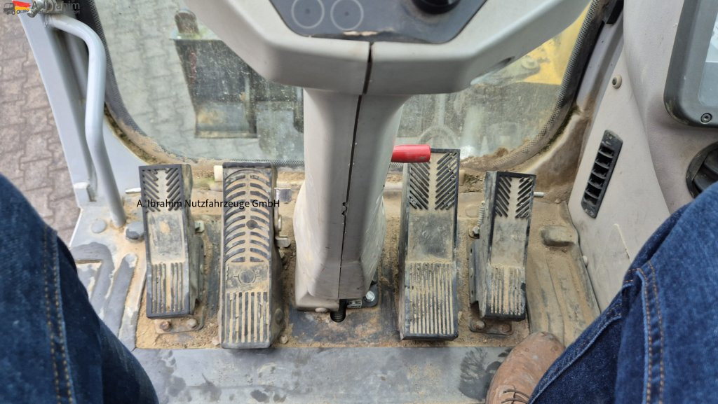 New Holland MH 2.6 Zustand gut, deutsche Maschine incl. Greifer und Dreservo - Bager na kolesih: slika 5 New Holland MH 2.6 Zustand gut, deutsche Maschine incl. Greifer und Dreservo - Bager na kolesih: slika 5