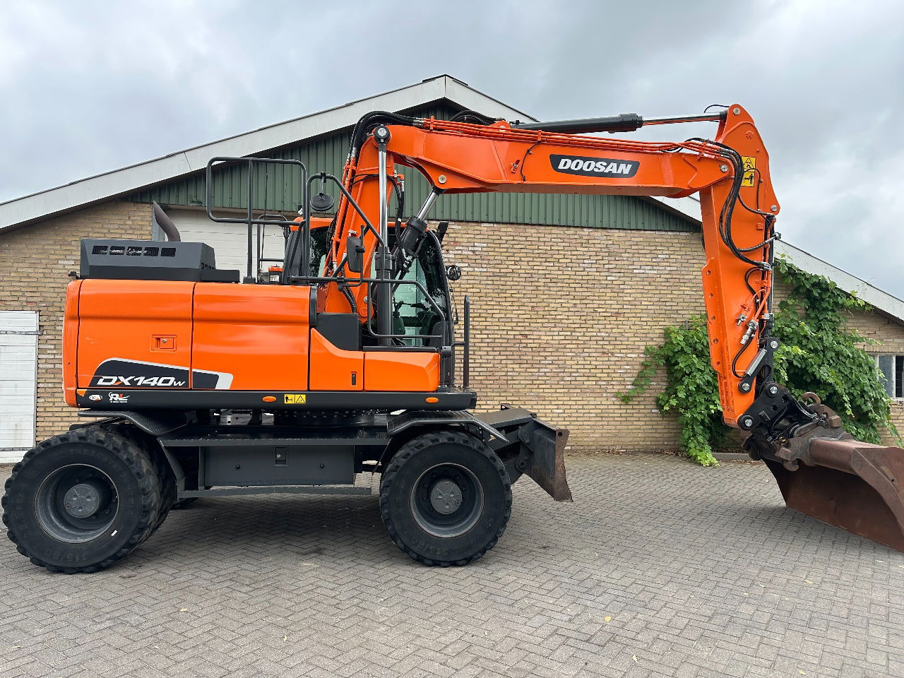 Doosan DX140W-5 - Bager na kolesih: slika 5 Doosan DX140W-5 - Bager na kolesih: slika 5