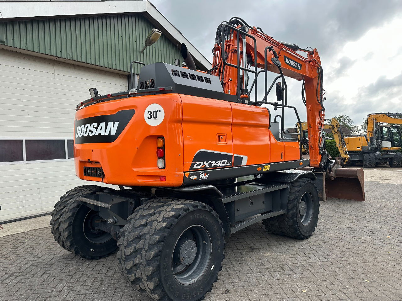 Doosan DX140W-5 - Bager na kolesih: slika 4 Doosan DX140W-5 - Bager na kolesih: slika 4