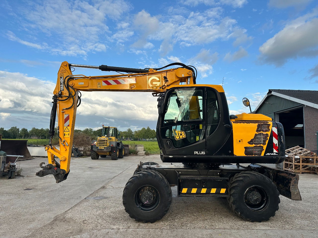 JCB JS145W - Bager na kolesih: slika 2 JCB JS145W - Bager na kolesih: slika 2