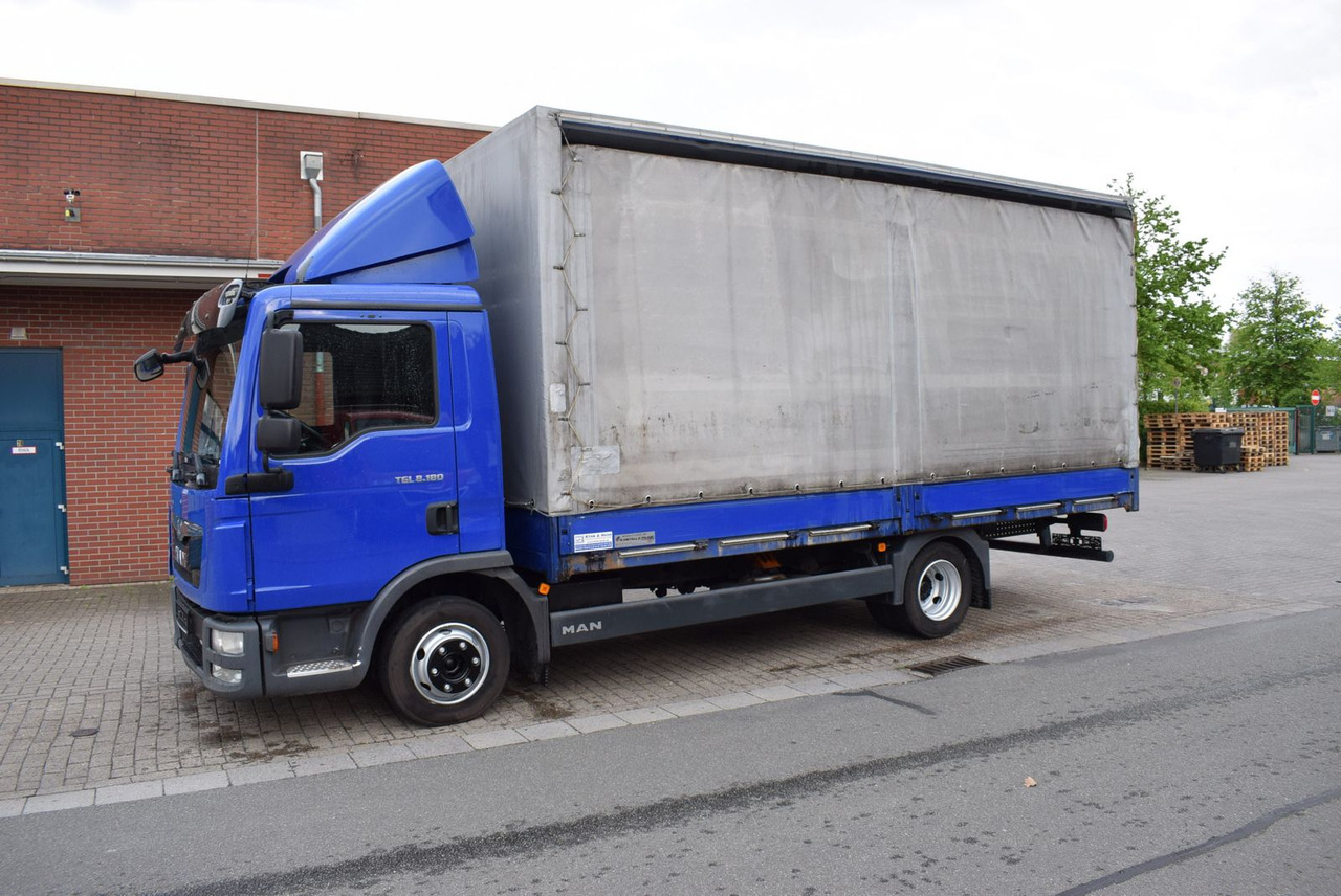 MAN TGL 8.180 Pritsche Schiebeplane Klima 3-Sitzer - Dostavno vozilo s ponjavo: slika 2 MAN TGL 8.180 Pritsche Schiebeplane Klima 3-Sitzer - Dostavno vozilo s ponjavo: slika 2