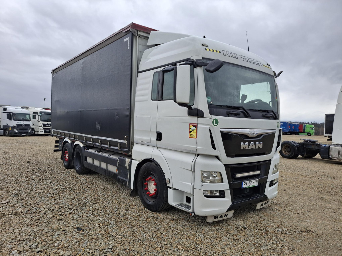 MAN TGX SOLÓWKA - Tovornjak s ponjavo: slika 1 MAN TGX SOLÓWKA - Tovornjak s ponjavo: slika 1