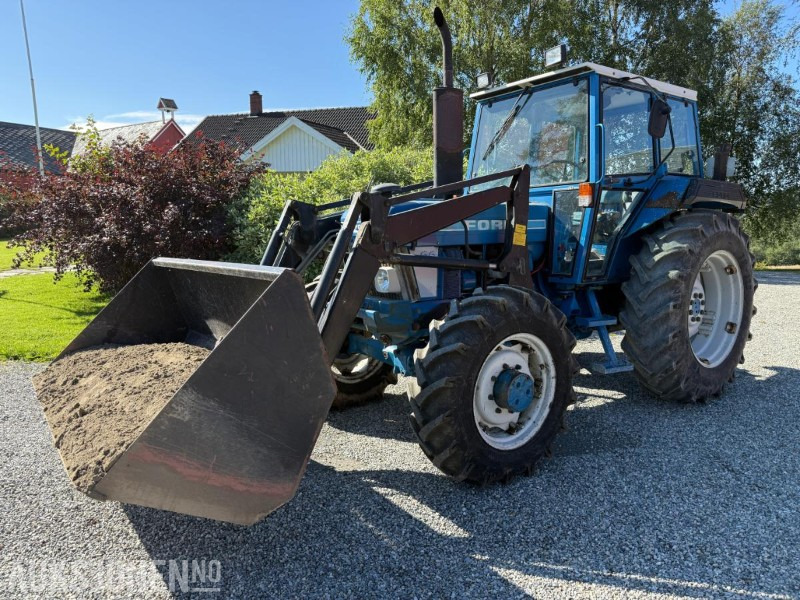 1985 Ford 6610 4x4 selges uten MVA med frontlaster, tvillinghjul bak og ekstra lodd fram. - Traktor: slika 1 1985 Ford 6610 4x4 selges uten MVA med frontlaster, tvillinghjul bak og ekstra lodd fram. - Traktor: slika 1