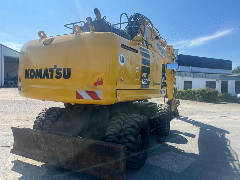 Komatsu PW180-10 - Bager na kolesih: slika 1 Komatsu PW180-10 - Bager na kolesih: slika 1