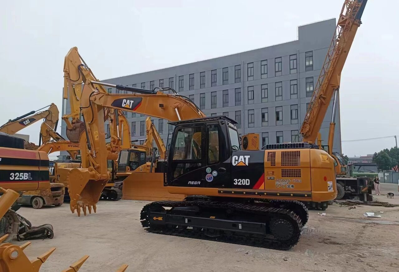 Caterpillar 320D - Bager na kolesih: slika 1 Caterpillar 320D - Bager na kolesih: slika 1