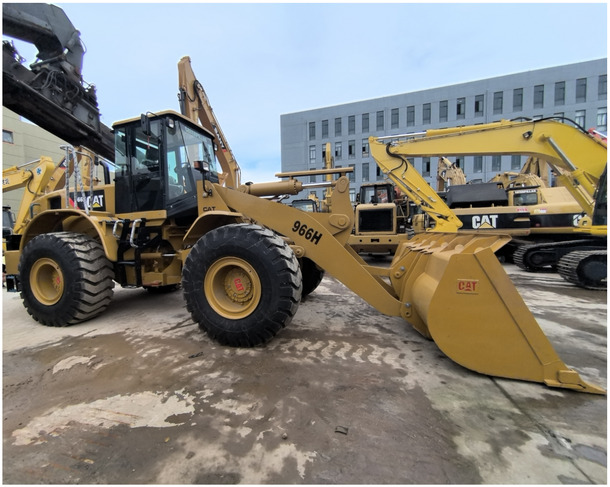 Good Condition High Performance Used Caterpillar Wheel Loader 966h for sale in shanghai yard - Kolesni nakladalec: slika 1 Good Condition High Performance Used Caterpillar Wheel Loader 966h for sale in shanghai yard - Kolesni nakladalec: slika 1