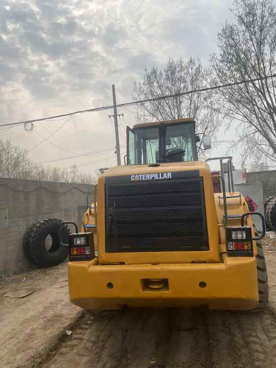 Kolesni nakladalec Good condition second hand cat 950h loader original japan cat loader in stock in shanghai yard: slika 6