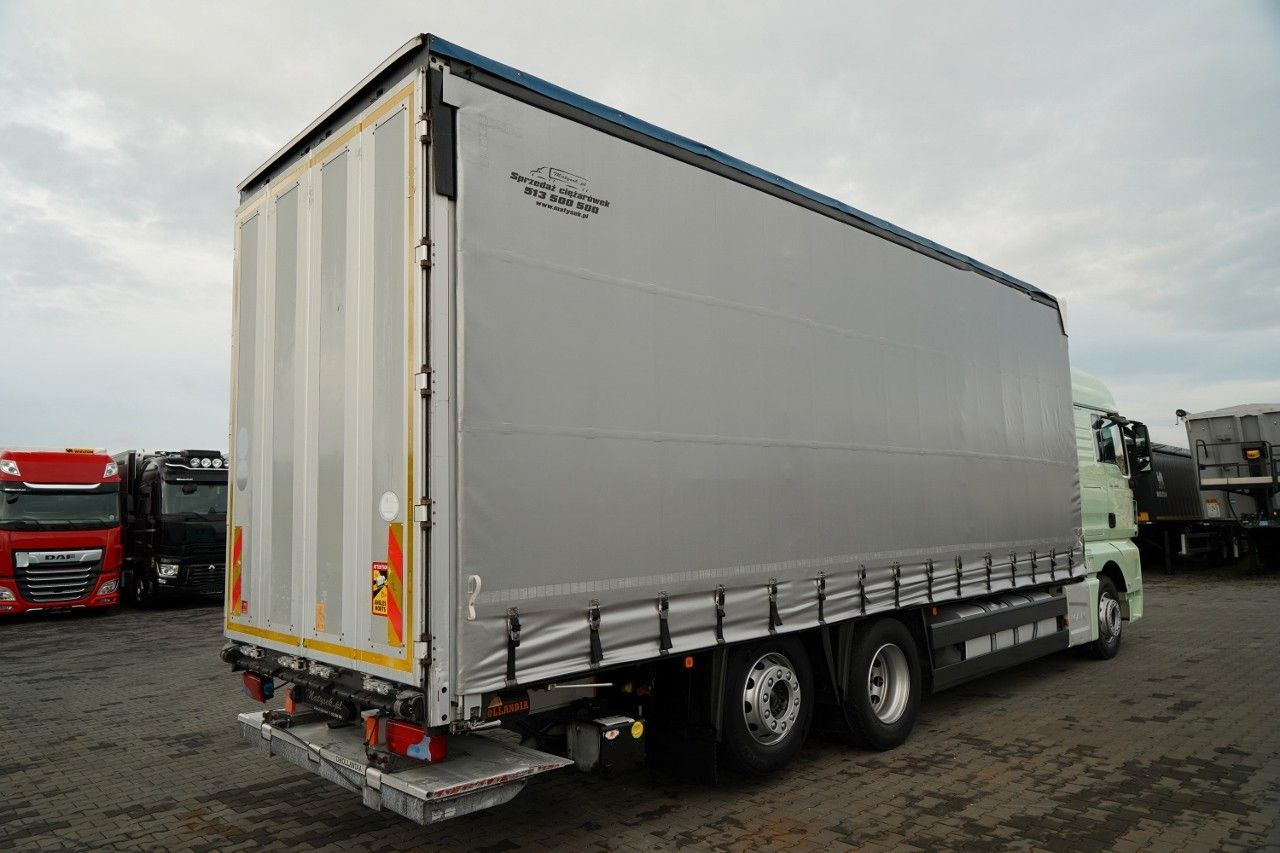 MAN TGX 26.440 / 6x2 / FIRANKA - 8,15 m / SOLÓWKA / MAN TGX 26.440 / 6x2 / FIRANKA - 8,15 m / SOLÓWKA / - Tovornjak s ponjavo: slika 4 MAN TGX 26.440 / 6x2 / FIRANKA - 8,15 m / SOLÓWKA / MAN TGX 26.440 / 6x2 / FIRANKA - 8,15 m / SOLÓWKA / - Tovornjak s ponjavo: slika 4
