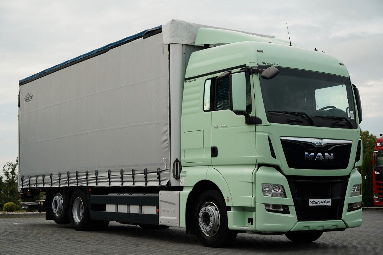 MAN TGX 26.440 / 6x2 / FIRANKA - 8,15 m / SOLÓWKA / MAN TGX 26.440 / 6x2 / FIRANKA - 8,15 m / SOLÓWKA / - Tovornjak s ponjavo: slika 1 MAN TGX 26.440 / 6x2 / FIRANKA - 8,15 m / SOLÓWKA / MAN TGX 26.440 / 6x2 / FIRANKA - 8,15 m / SOLÓWKA / - Tovornjak s ponjavo: slika 1