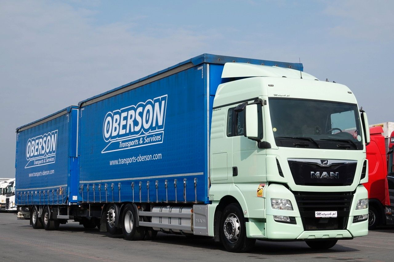 MAN TGX 26.460 / ZESTAW TANDEM PRZEJAZDOWY / 120 M3 - Tovornjak s ponjavo: slika 1 MAN TGX 26.460 / ZESTAW TANDEM PRZEJAZDOWY / 120 M3 - Tovornjak s ponjavo: slika 1