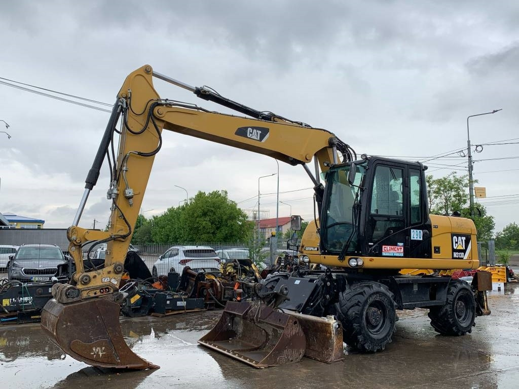 CAT M 313 D - Bager na kolesih: slika 1 CAT M 313 D - Bager na kolesih: slika 1