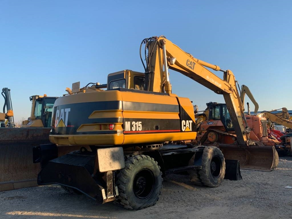 Bager na kolesih CAT M 315: slika 7