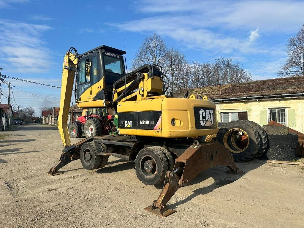 CAT M 318 D MH - Bager za prekladanje primarnih/ Sekundarnih surovin: slika 3 CAT M 318 D MH - Bager za prekladanje primarnih/ Sekundarnih surovin: slika 3
