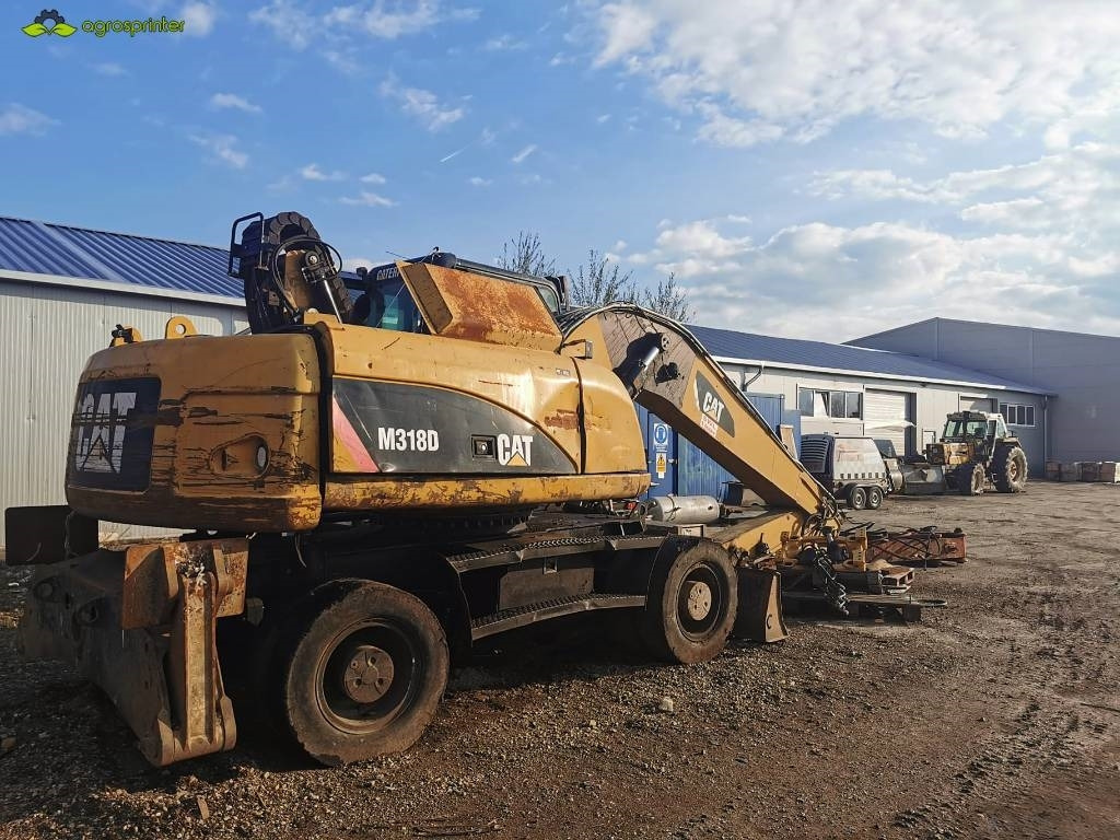 CAT M 318 D - Bager za prekladanje primarnih/ Sekundarnih surovin: slika 3 CAT M 318 D - Bager za prekladanje primarnih/ Sekundarnih surovin: slika 3