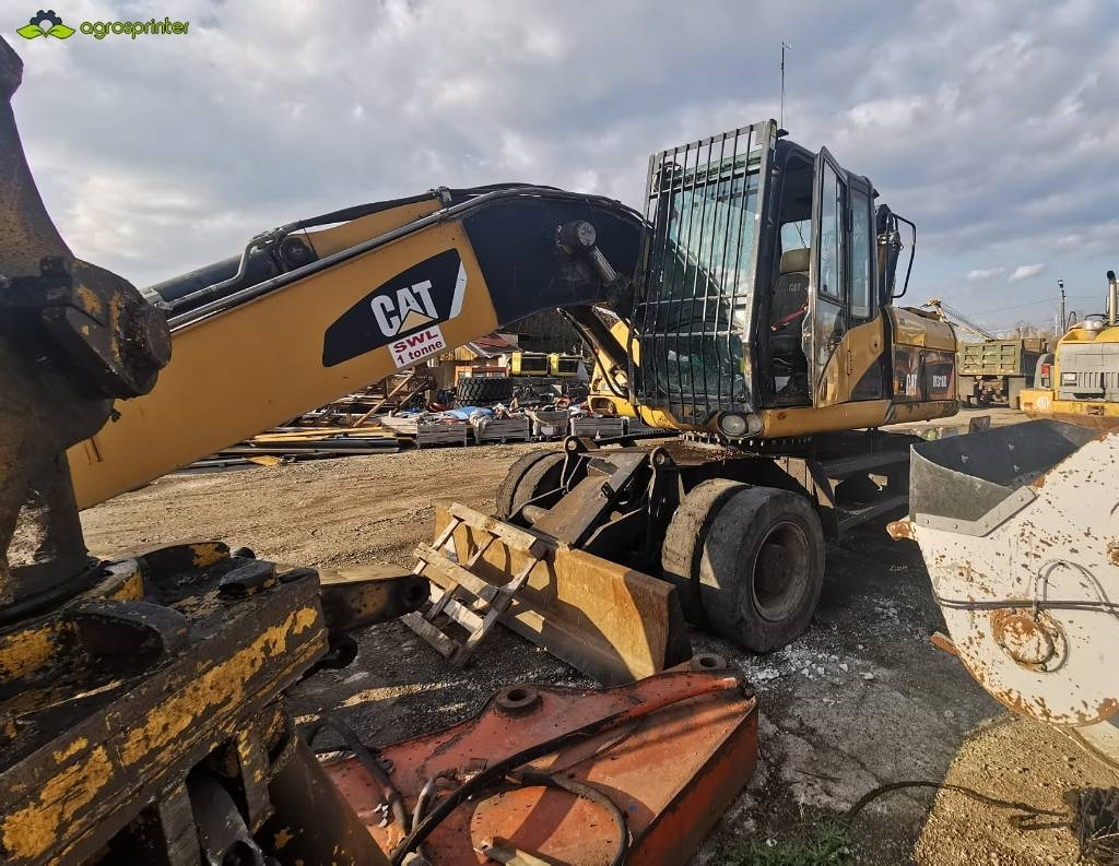 CAT M 318 D - Bager za prekladanje primarnih/ Sekundarnih surovin: slika 2 CAT M 318 D - Bager za prekladanje primarnih/ Sekundarnih surovin: slika 2