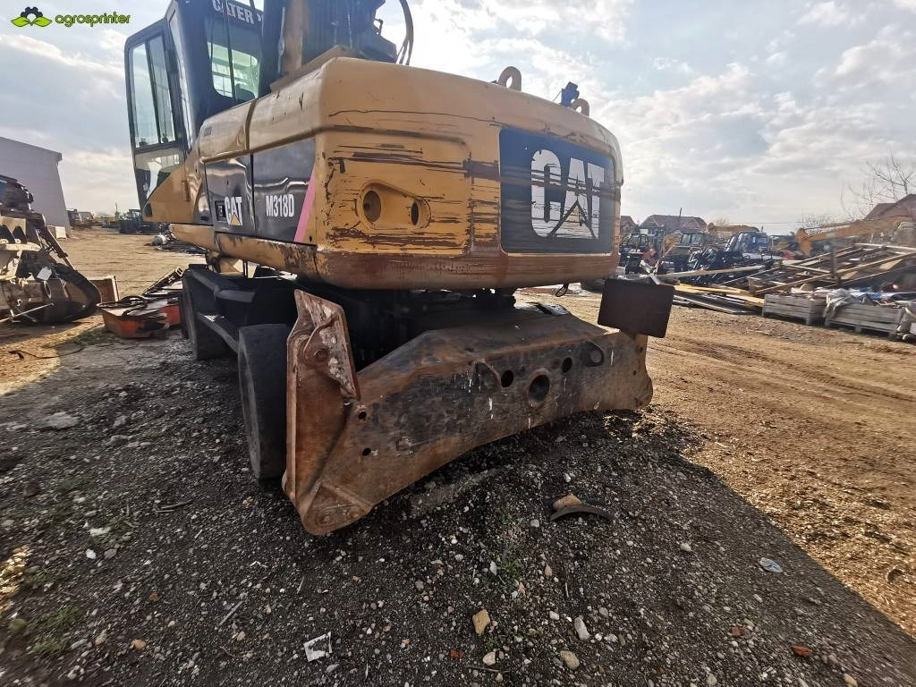 CAT M 318 D - Bager za prekladanje primarnih/ Sekundarnih surovin: slika 5 CAT M 318 D - Bager za prekladanje primarnih/ Sekundarnih surovin: slika 5