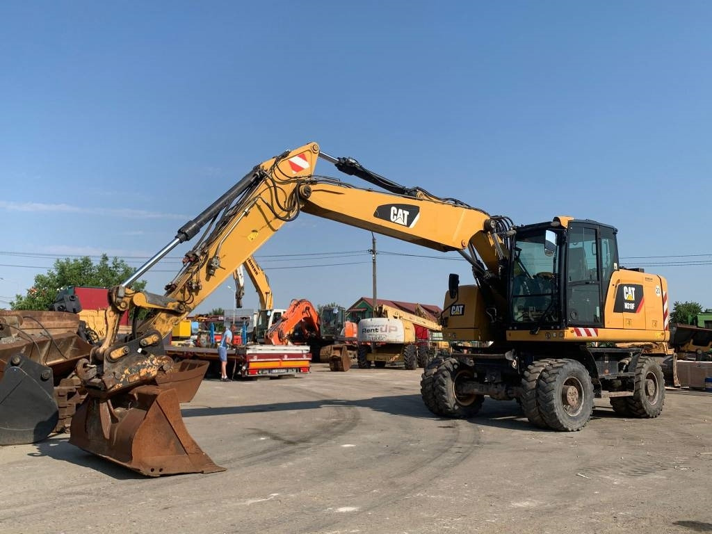 CAT M 318 F - Bager na kolesih: slika 1 CAT M 318 F - Bager na kolesih: slika 1