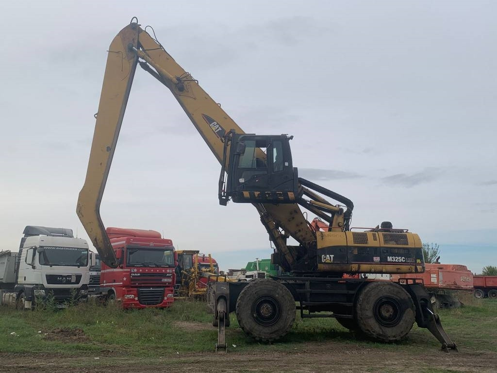 CAT M 325 C L MH - Bager za prekladanje primarnih/ Sekundarnih surovin: slika 2 CAT M 325 C L MH - Bager za prekladanje primarnih/ Sekundarnih surovin: slika 2