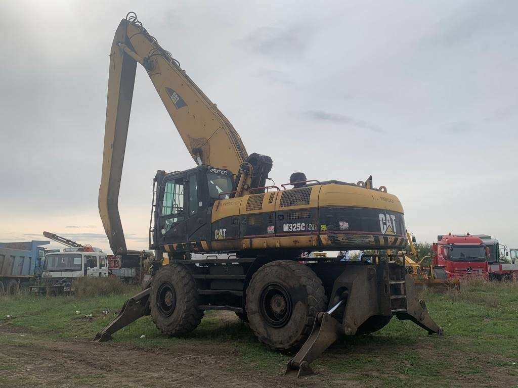 CAT M 325 C L MH - Bager za prekladanje primarnih/ Sekundarnih surovin: slika 3 CAT M 325 C L MH - Bager za prekladanje primarnih/ Sekundarnih surovin: slika 3