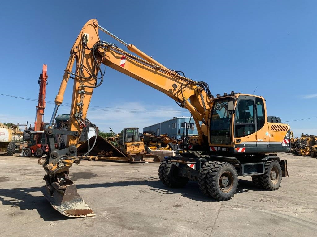 Hyundai Robex 180 W-9 A - Bager na kolesih: slika 1 Hyundai Robex 180 W-9 A - Bager na kolesih: slika 1
