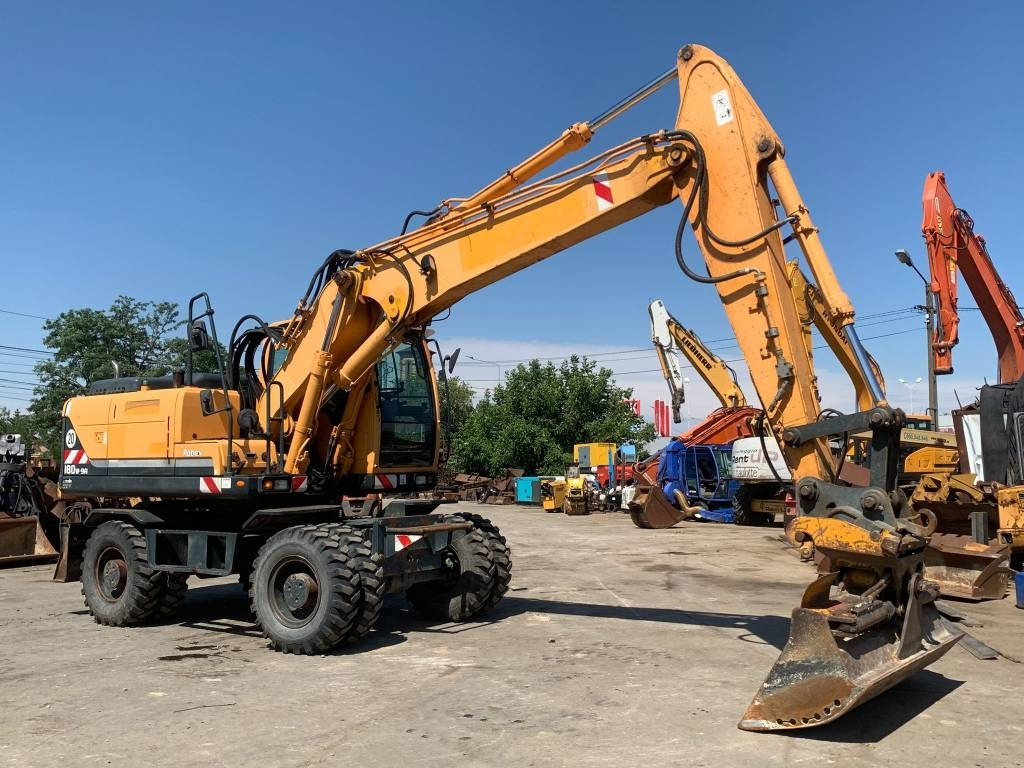 Hyundai Robex 180 W-9 A - Bager na kolesih: slika 5 Hyundai Robex 180 W-9 A - Bager na kolesih: slika 5